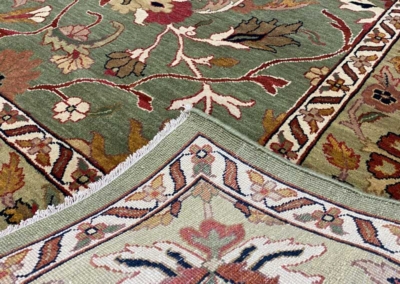 Mahal green base rug with border front and back