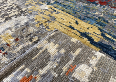 Joyful wool contemporary rug front and back