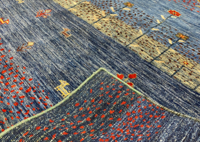 Luri transitional blue rug front and back