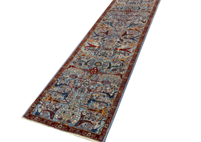 Nooristan blue and red rug angle