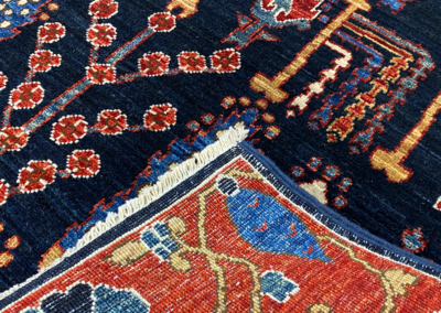 Fine Aryana wool area rug navy and multi front and back