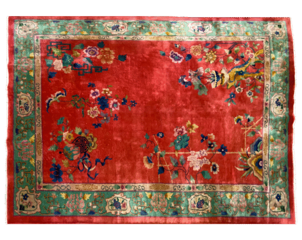 Traditional Chinese hand-woven area rug. This area rug features a classic design with floral designs and a green border.