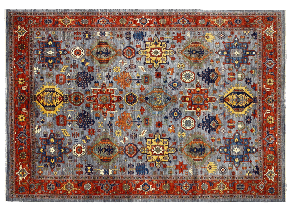 This bold tribal area rug is 9x12 featuring large tribal geometric shapes with bold red, blue and multicolored tones. This rug is hand knotted with wool.