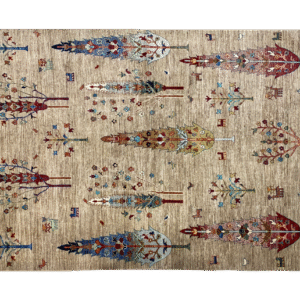 6x9 area rug featuring beautiful trees in blue, red, pink and yellow tones.