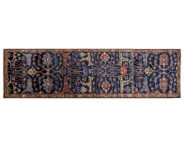 Bold long 3x10 area rug runner with a deep blue background, yellow, and red tribal designs. This rug features a geometric pattern with a border and short fringe.