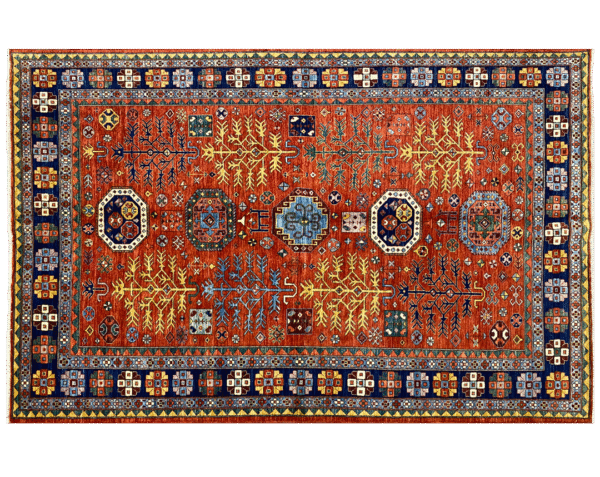 Bold large rug with deep red/rust tones and a blue border. This area rug is hand-knotted with wool.
