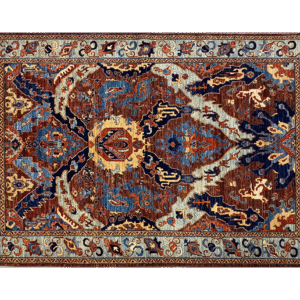 Bold rug with deep blues, reds, and yellow. This rug features a geometric pattern with a border and short fringe.
