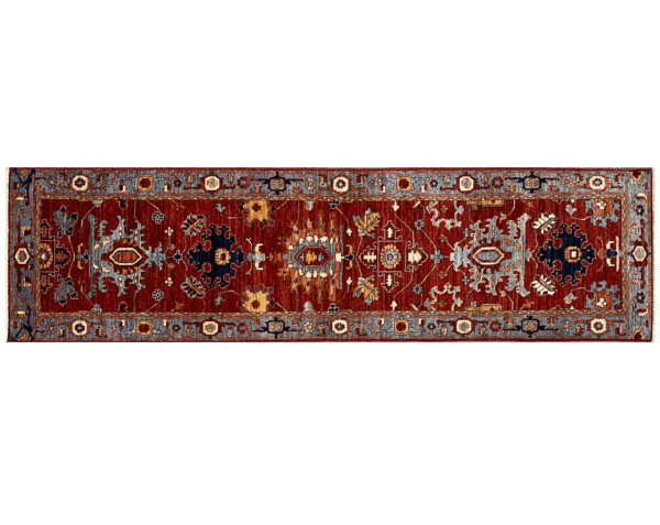 Stunning long 3x10 area rug runner with a deep red background. This rug features a geometric pattern with blue and yellow tones and a border and short fringe.