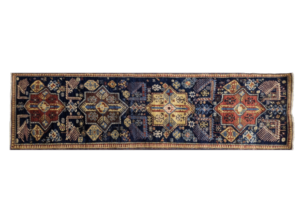 Stunning long 3x10 area rug runner with a deep blue background, yellow, and red. This rug features a geometric pattern with a border and short fringe.
