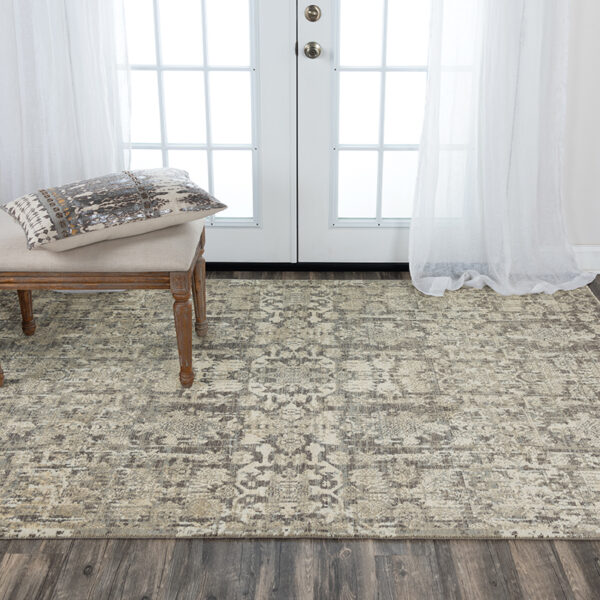 Medium modern 8x10 area rug with transitional style. Wool with brown and ivory tones.