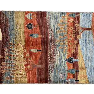 Small bold multicolored small rug with tree and landscape designs. This area rug is hand-knotted with wool.
