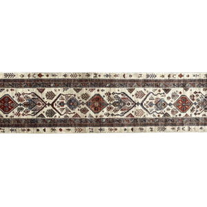 Aryana 3x12 area rug with an ivory background and tribal blue and red designs. This rug is hand-knotted with wool.