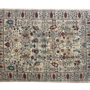 Large 8x10 area rug with trees and a border. This rug is machine crafted with wool