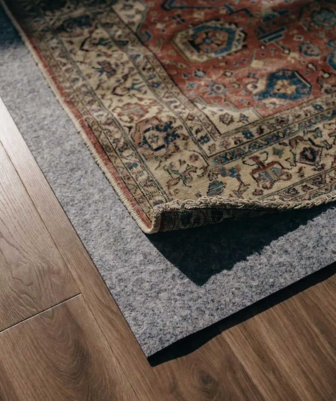 Protect your rug and hardwood floors with the right rug pad. Atiyeh Bros. shares 120+ years of expertise on sizing, safety, and floor-safe materials.