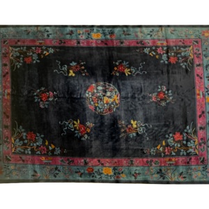 Large 9 x 12 traditional Chinese blue and purple area rug. This rug is hand-knotted with wool.