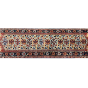 Tribal designed Wool rug. This long area rug is 3x5 and is hand-knotted with wool.