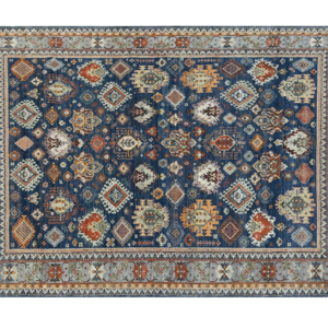 Tribal area rug with blue and multicolored tones.