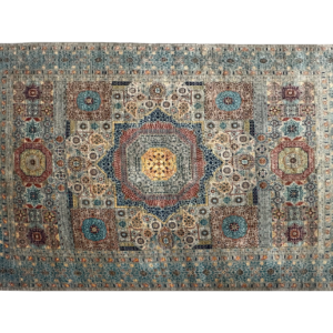 Stunning Mamluk 6 x 8 area rug with a center design. This rug has fun colors and is hand- knotted with wool.