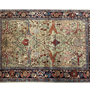 4x6 Tribal Aryana area rug with a green background and blue and rust border with short fringe.