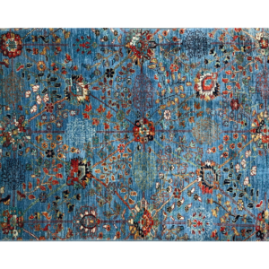 Tribal area rug with blue and multicolored tones. This rug is hand-knotted with wool.