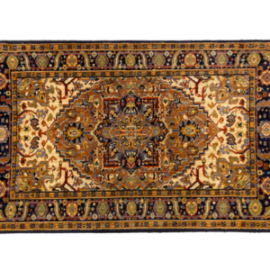 Traditional styled 2 x 4 entry way rug. This rug is crafted with wool and has a short fringe.