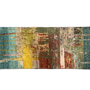 Artistic area rug runner featuring geometric earth tones. Hand-knotted with wool.