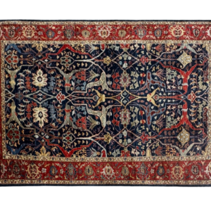Tribal 6x9 area rug with a navy background and red border. This rug is hand-knotted with wool.