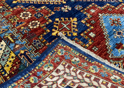 Makmal transitional blue and red rug front and back