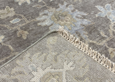 Kahsu earth tone rug front and back